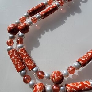 Handmade beaded necklace. 19 in. Floral beads and faux pearls.